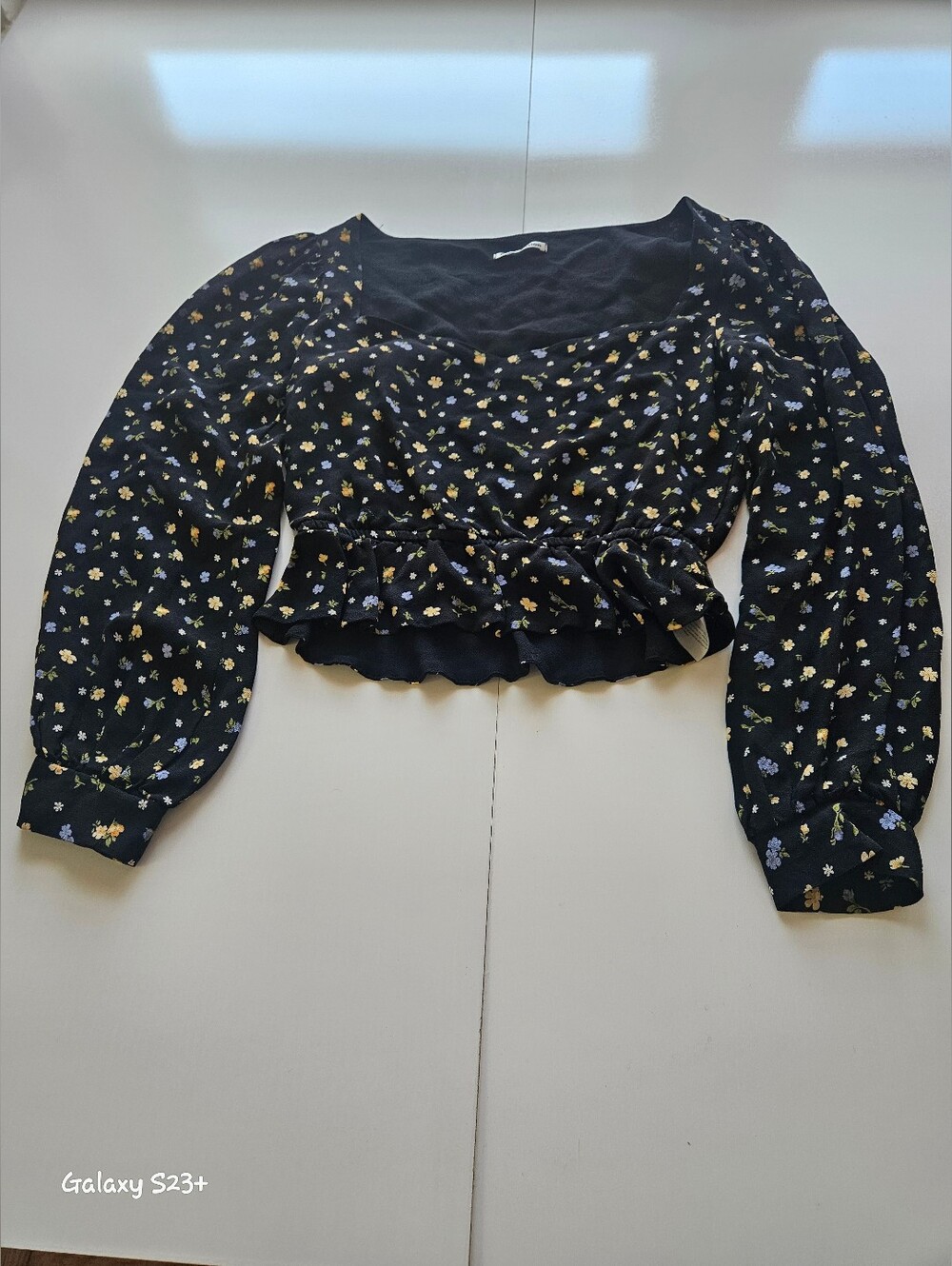 Reformation- Womens Black Floral Long-Sleeve Smocked Peplum Top